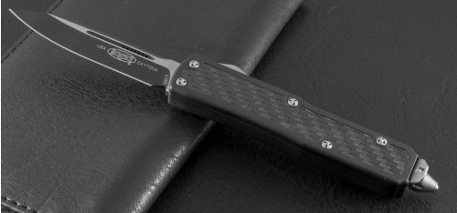 Microtech Knives Daytona S/E Automatic OTF D/A Knife (3in Black Plain S35-VN) 124-1 - Front