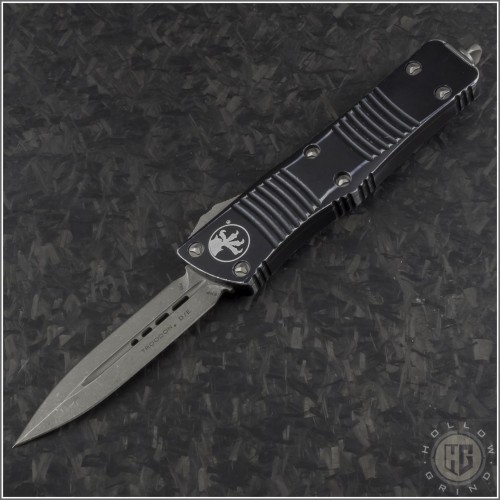 (#138-10DBK) Microtech Distressed Black Troodon D/E Apocalyptic Plain - Front