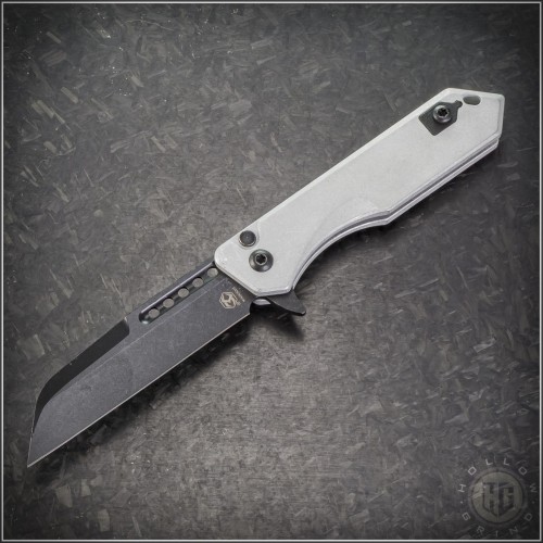 (#HTK-H213-8A-BLZ) Heretic Knives Blizzardworn Jinn Button Lock Flipper Battle Black Wharncliffe - Front