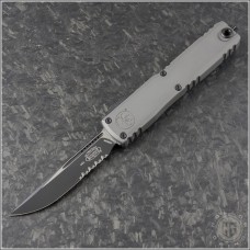 (#1121-2NC) Microtech Natural Clear Ultratech ZBP S/E Black Part Serrated - Front