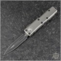 (#232-1TG) Microtech Titanium Gray UTX-85 D/E Black Plain - Front