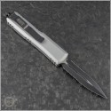 (#232-2CR) Microtech Clear UTX-85 D/E Black Part Serrated - Back