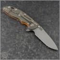 (#RH-XM1835-96) Rick Hinderer Tri-Way XM-18 3.5" Spearpoint Working FInish - Battle Bronze - Orange G10 - Back