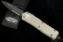 (#109-2TA) Microtech Scarab D/E Tan Handle Black Serrated - Front