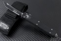 Microtech Knives Ultratech T/E Automatic OTF D/A Knife (3.44in Black Part Serr S35-VN) 123-2-2012 - Front